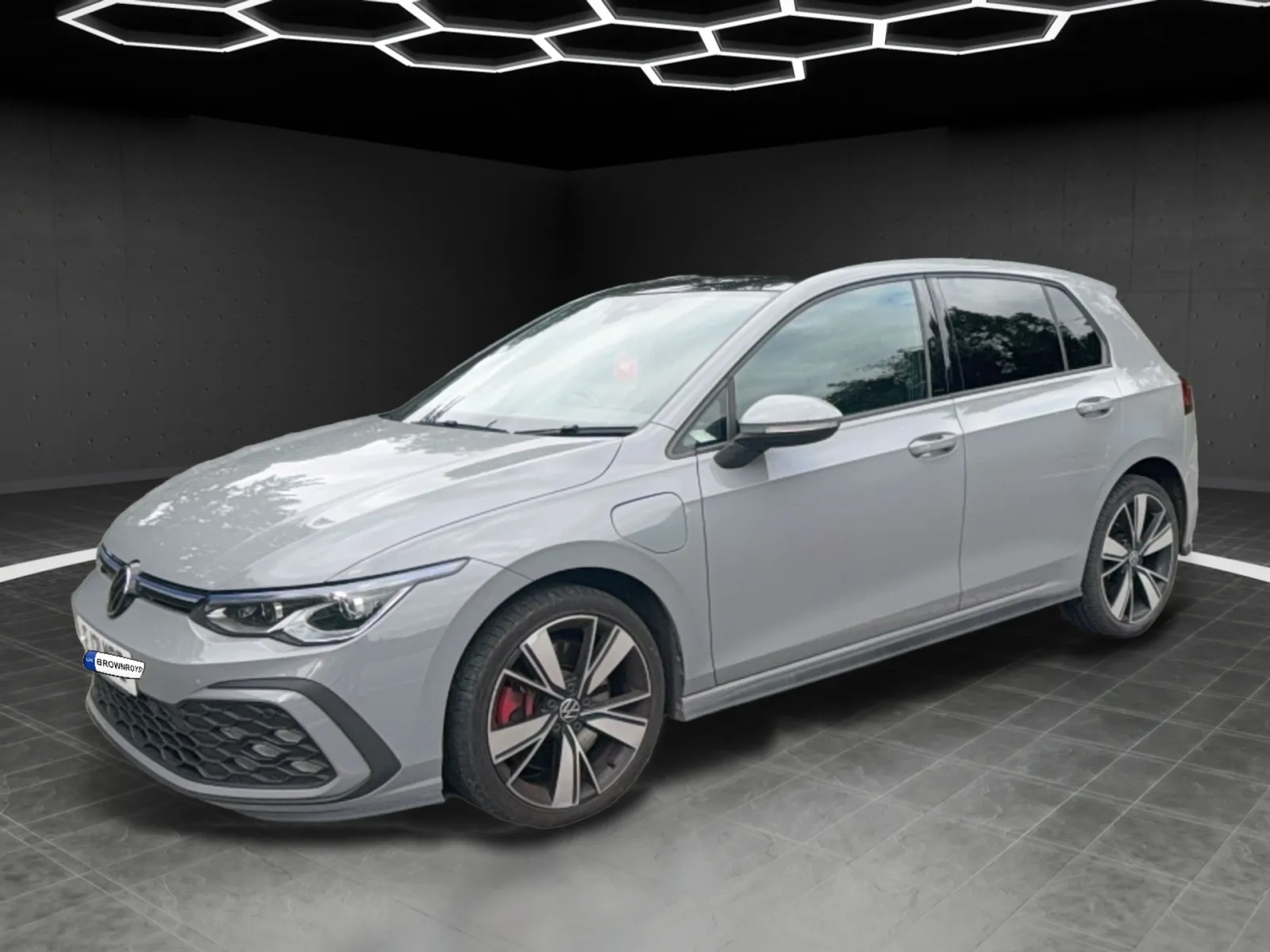 Volkswagen Golf GTE as delivered by Podiar, standing in the Midnight showroom