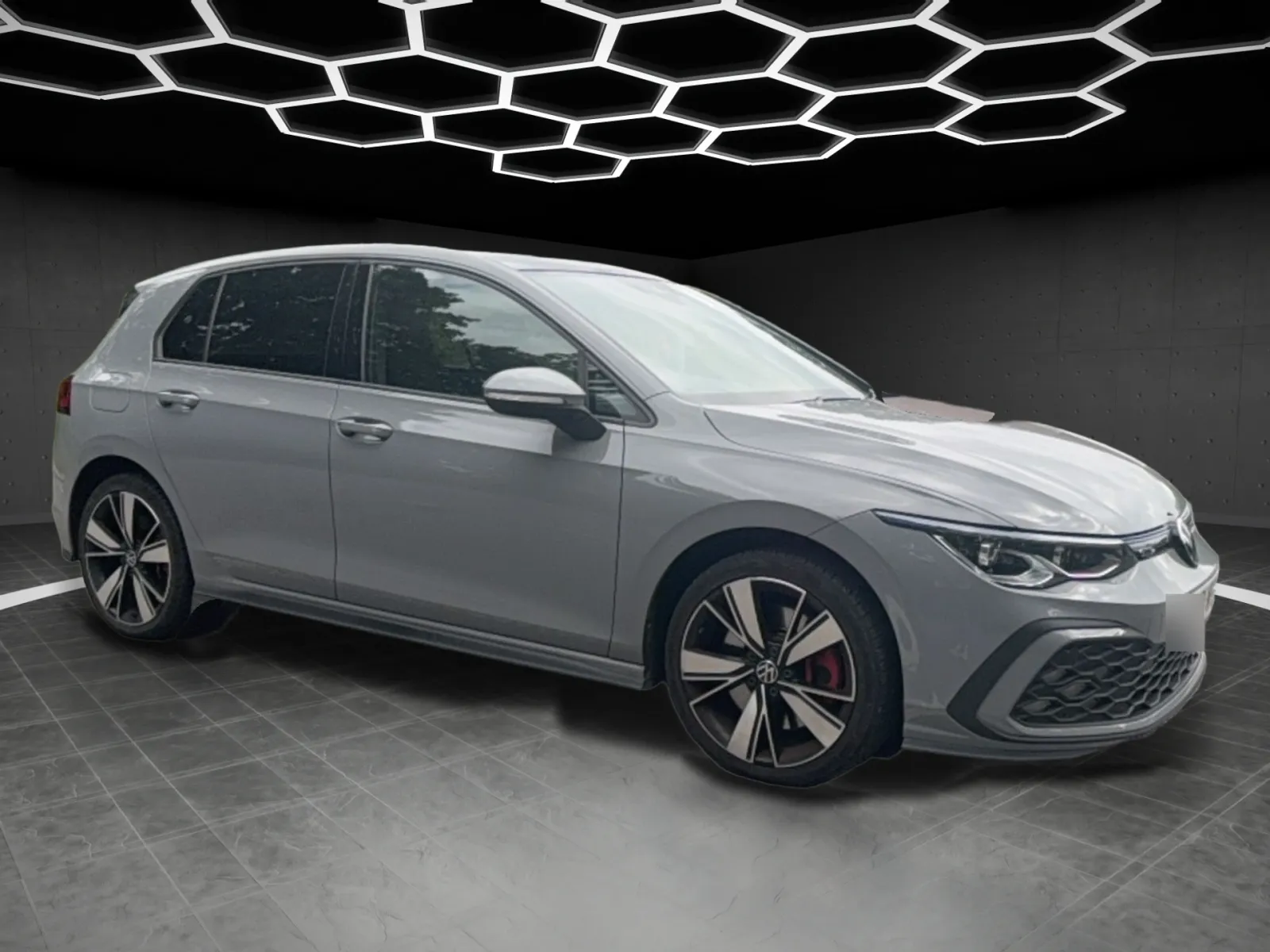 Volkswagen Golf GTE in the Midnight showroom, front three-quarter, right
